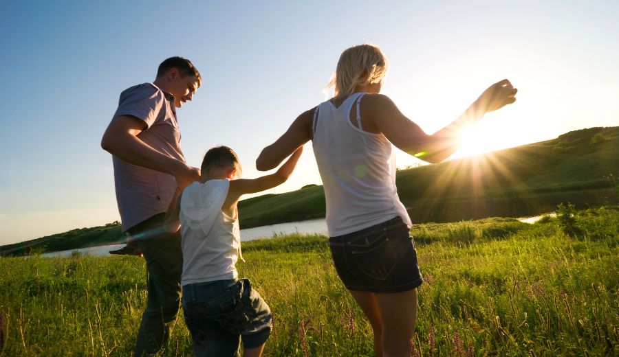 family with life insurance enjoying a sunny day outdoors in Aurora, IL